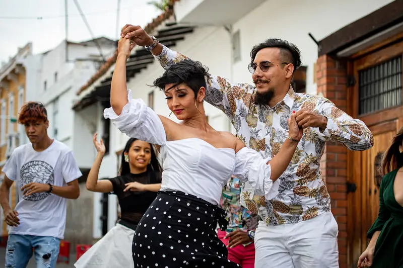 Salsa dancers on a colonial street in Cali